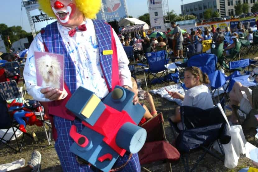 A clown mingles with the crowd at Frisco Freedom Fest.   