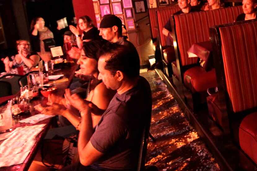 Audience members enjoy the show at Pocket Sandwich Theatre. 