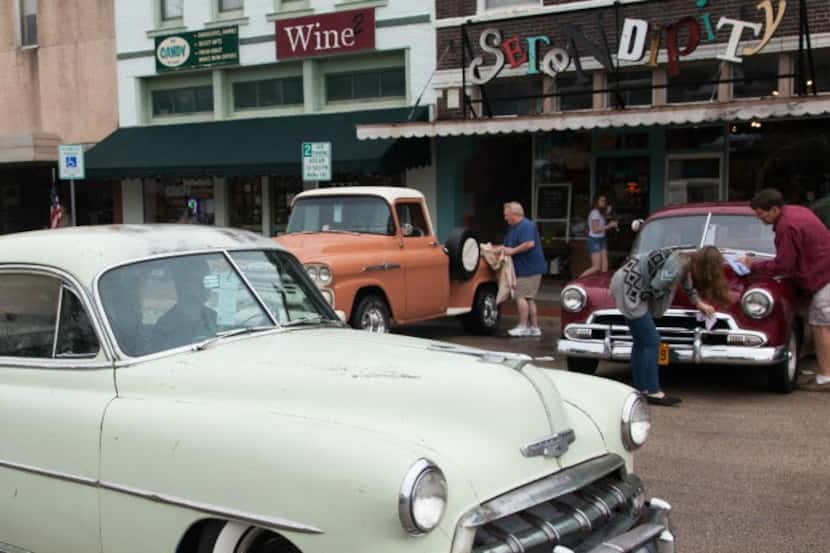 Vintage cars  are on display at the  Arts and Autos Extravaganza in Denton.
