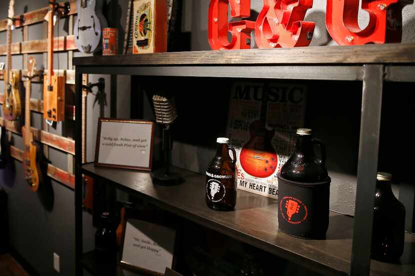 Merchandises are on display for sale at Guitars and Growlers in Richardson, Texas, Tuesday,...
