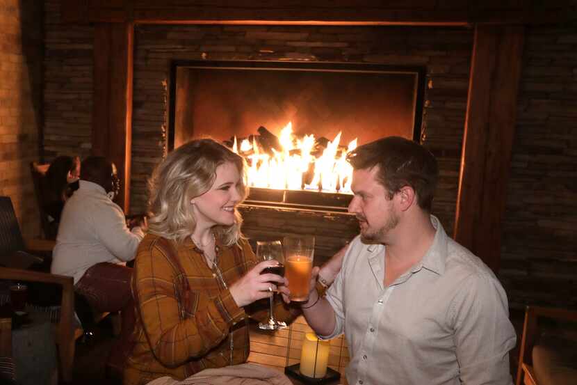 Enjoy drinks by the fire at the Outlaw Taproom at the Four Seasons.