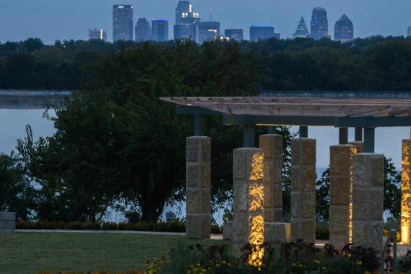The Dallas skyline and White Rock Lake can be seen from the new Tasteful Place edible garden...