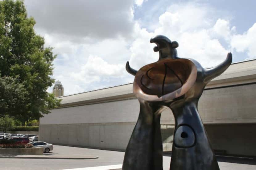 The Kimbell Art Museum in Fort Worth's cultural district. In the foreground is "Woman...