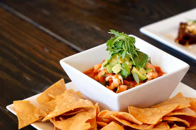 Ceviche includes snook and shrimp cured in lime juice and avocado and homemade chips at Mesa...