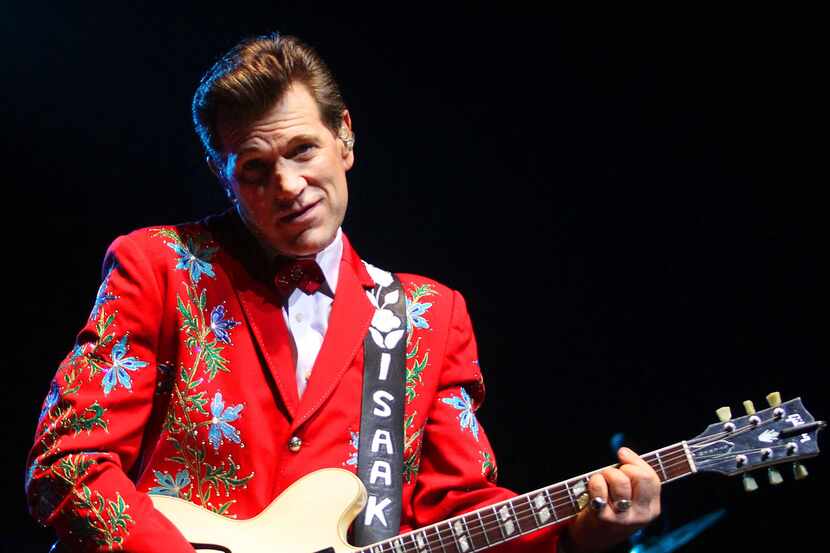 Chris Isaak performs.