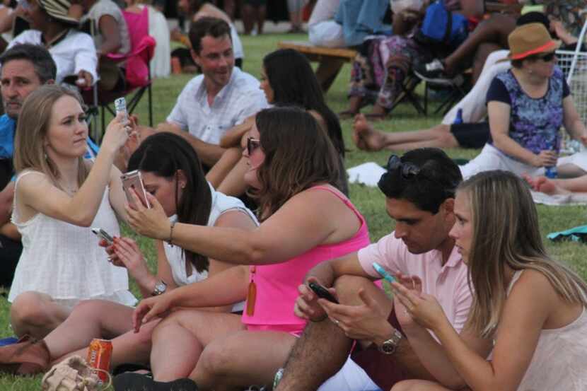 Guests get ready for an outdoor summer concert.