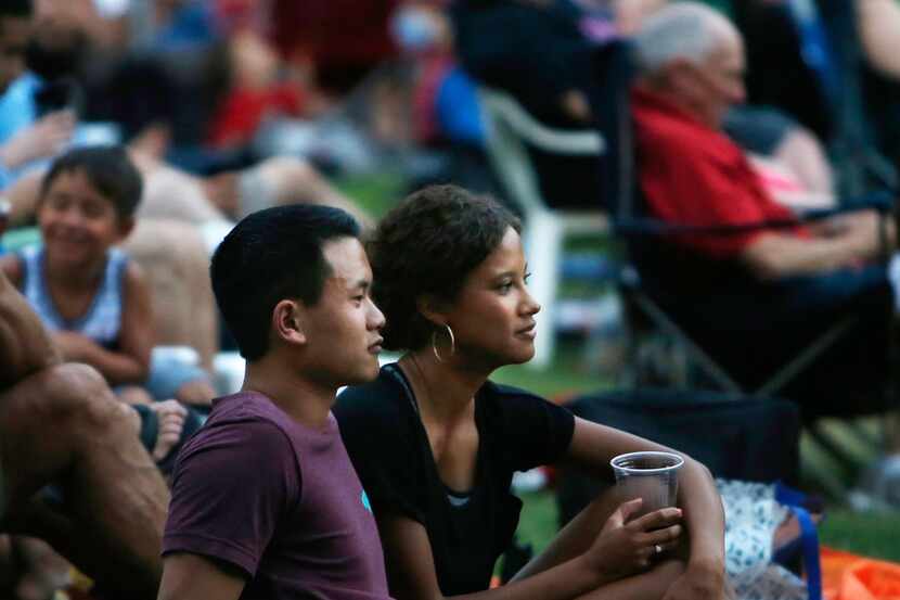Guests sit on the lawn at the Fort Worth Symphony Orchestra's Concerts in the Garden.