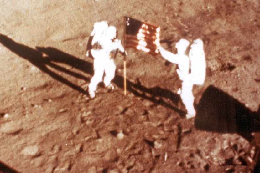 NASA handout file photo taken on July 20, 1969, shows astronauts Neil Armstrong and "Buzz"...