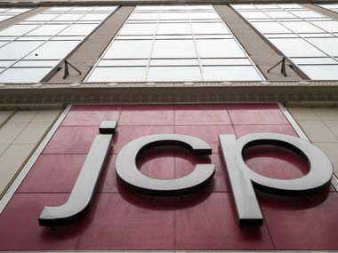 File photo of the J.C. Penney online store logo and stock symbol seen hanging outside the Manhattan Mall in New York.