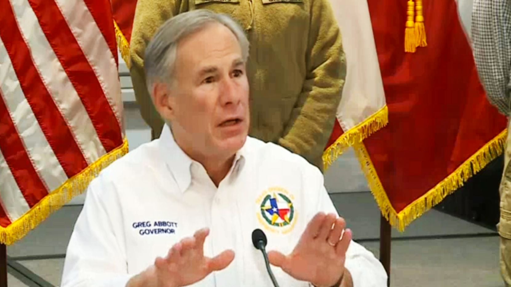 Governor Greg Abbott speaks during a press conference with an update on the state's response...
