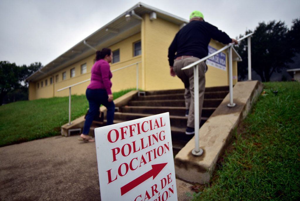 Voters walk toward the pols on Election Day at Palabra de Vida Church in Dallas.