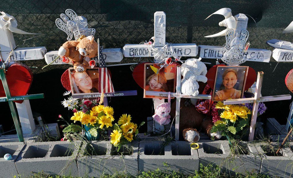 Remembrances for the shooting victims still stand on the roadside of Highway 87 by the...