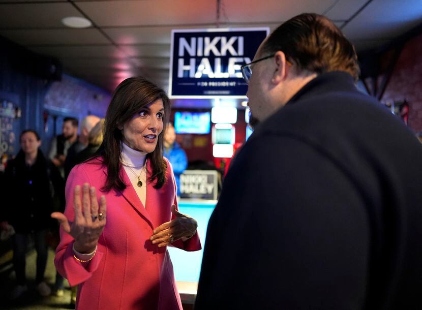 Republican presidential candidate former UN Ambassador Nikki Haley, left, speaks with...