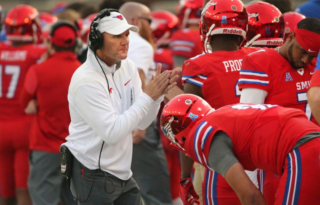 SMU head coach Chad Morris tries to rally his team against Navy during the second half of an...