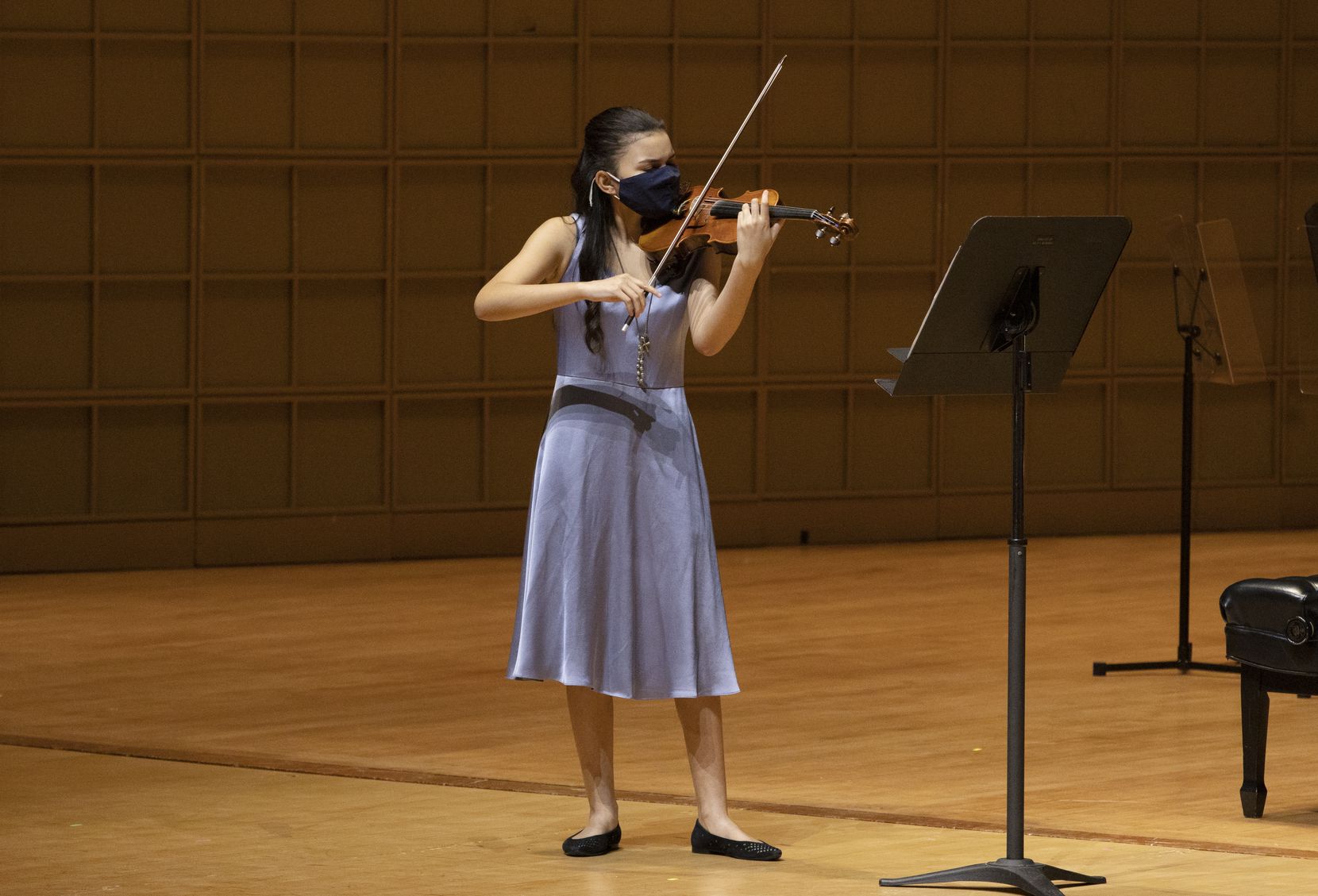 Young Strings student performs at recital.