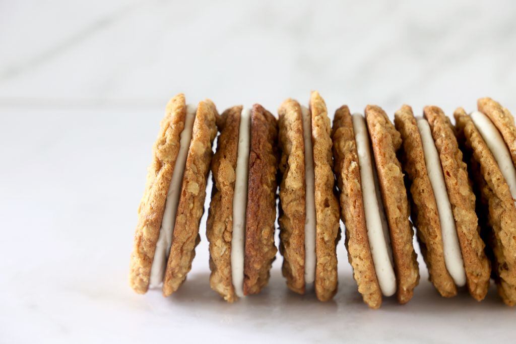 Homemade Oatmeal Cream Pies sandwich soft, chewy cookies around fluffy marshmallow buttercream.