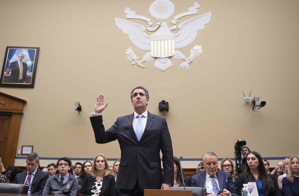 Michael Cohen, US President Donald Trump's former personal attorney, is sworn in to testify...