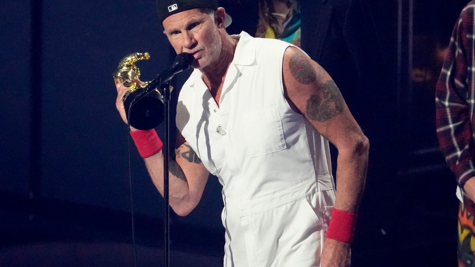Chad Smith, of Red Hot Chili Peppers, accept the global icon award at the MTV Video Music...