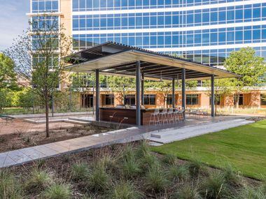 An outdoor serving bar and eating area are among the amenities at the Galatyn Commons office...