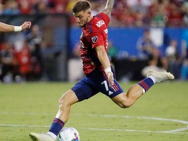 FC Dallas forward Paul Arriola (7) takes a shot to score the only goal during the first half...