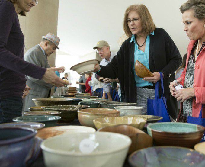Guests select bowls at the annual Empty Bowls event in Dallas.