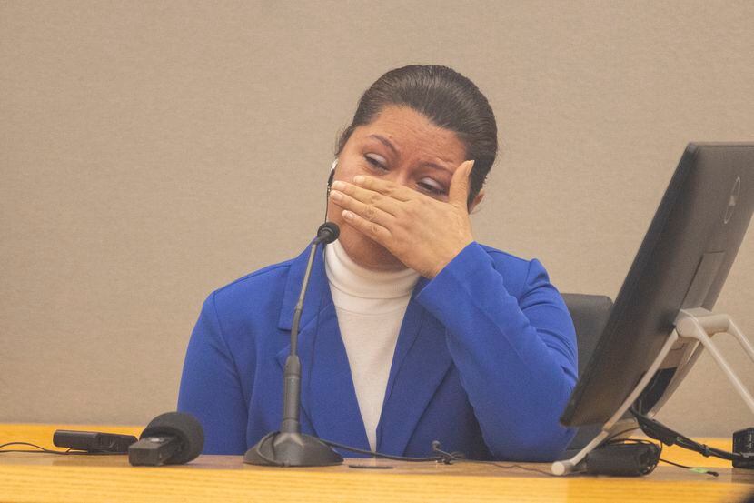 Ernestina Valadez cries as she talks while on the witness stand in the trial of Lisa Dykes,...