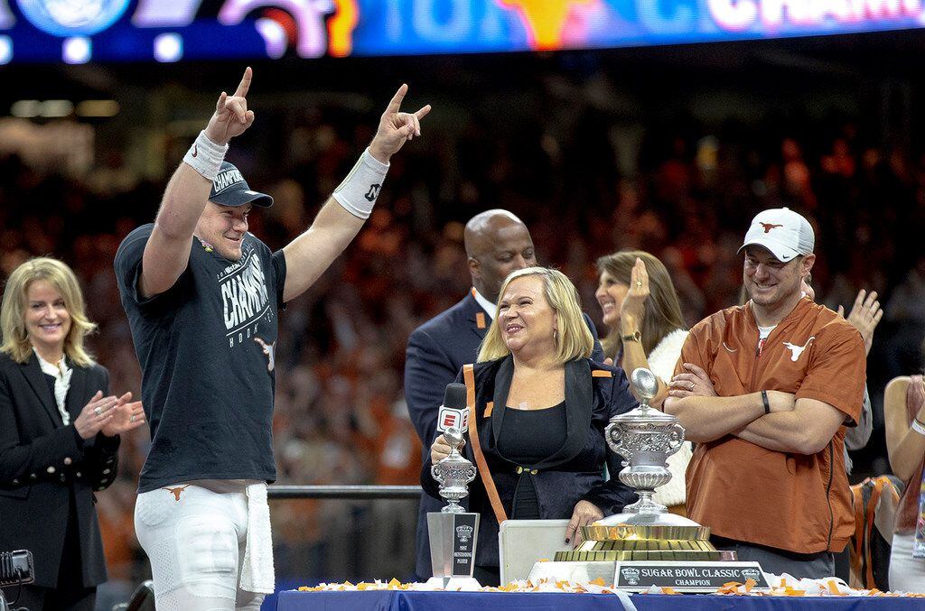 Texas quarterback Sam Ehlinger celebrates after defeating Georgia 28-21 in the Sugar Bowl...