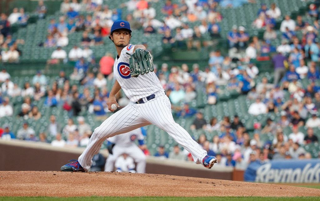 Chicago Cubs starting pitcher Yu Darvish delivers against the Colorado Rockies during the...