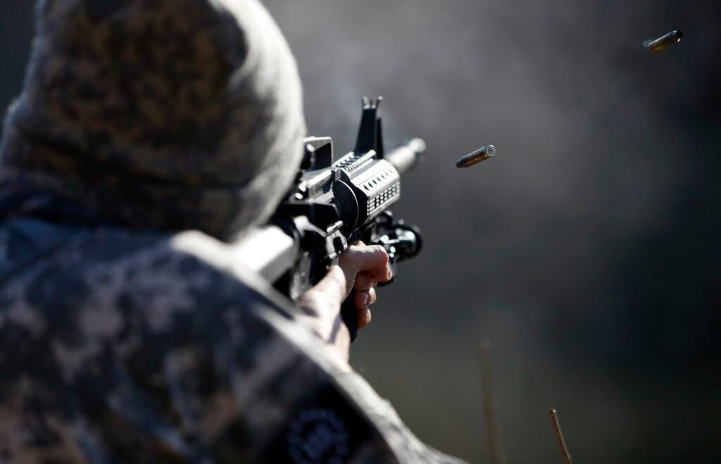  Jeff Franz, a member of the Bureau of American-Islamic Relations, shot at a target for practice along the South Sulphur River near Neylandville in February. (Rose Baca/Staff Photographer)