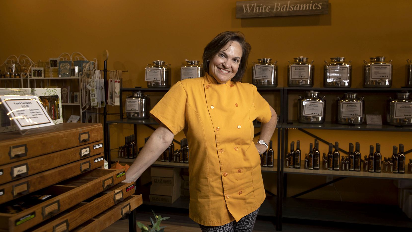 Owner and chef Michelle Spangler poses for a portrait at her store, Infused Oils and...