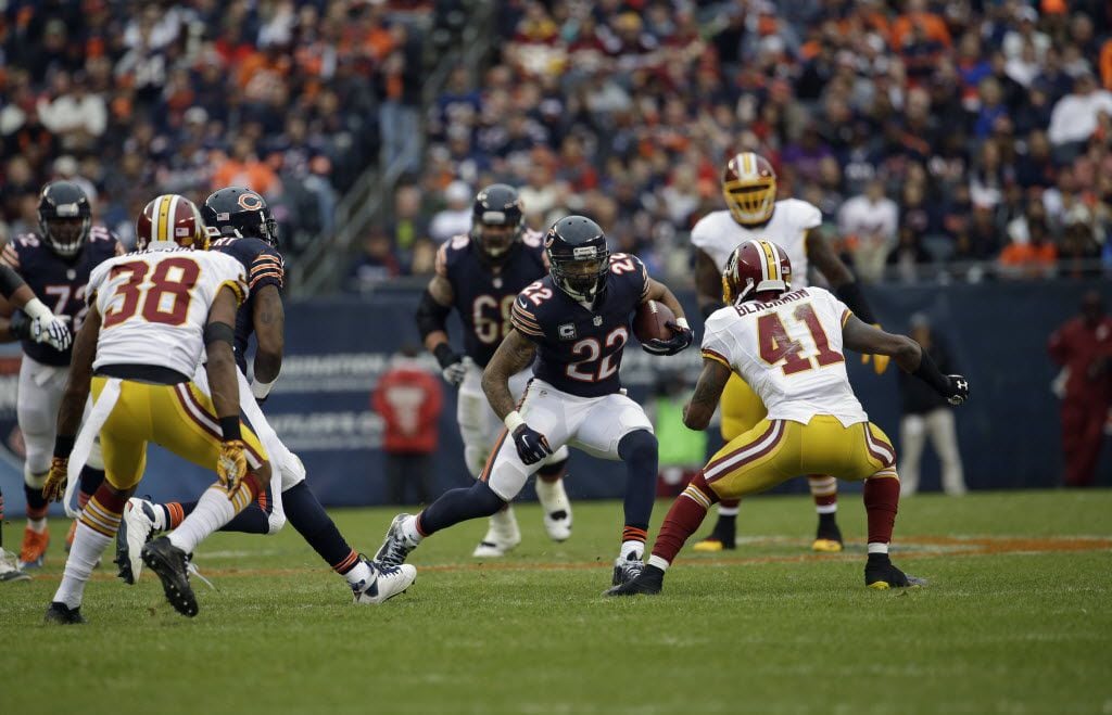 Chicago Bears running back Matt Forte (22) rushes against the Washington Redskins during the...