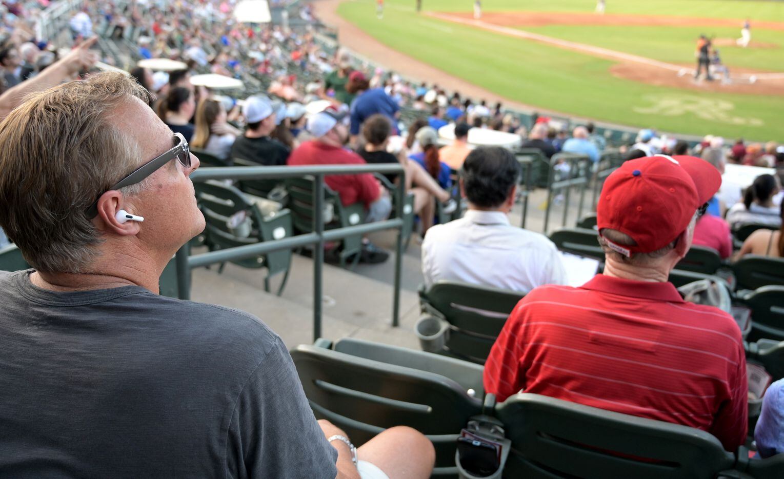 Al Leiter watches as his son Frisco RoughRiders pitcher Jack Leiter (22) pitches during a...