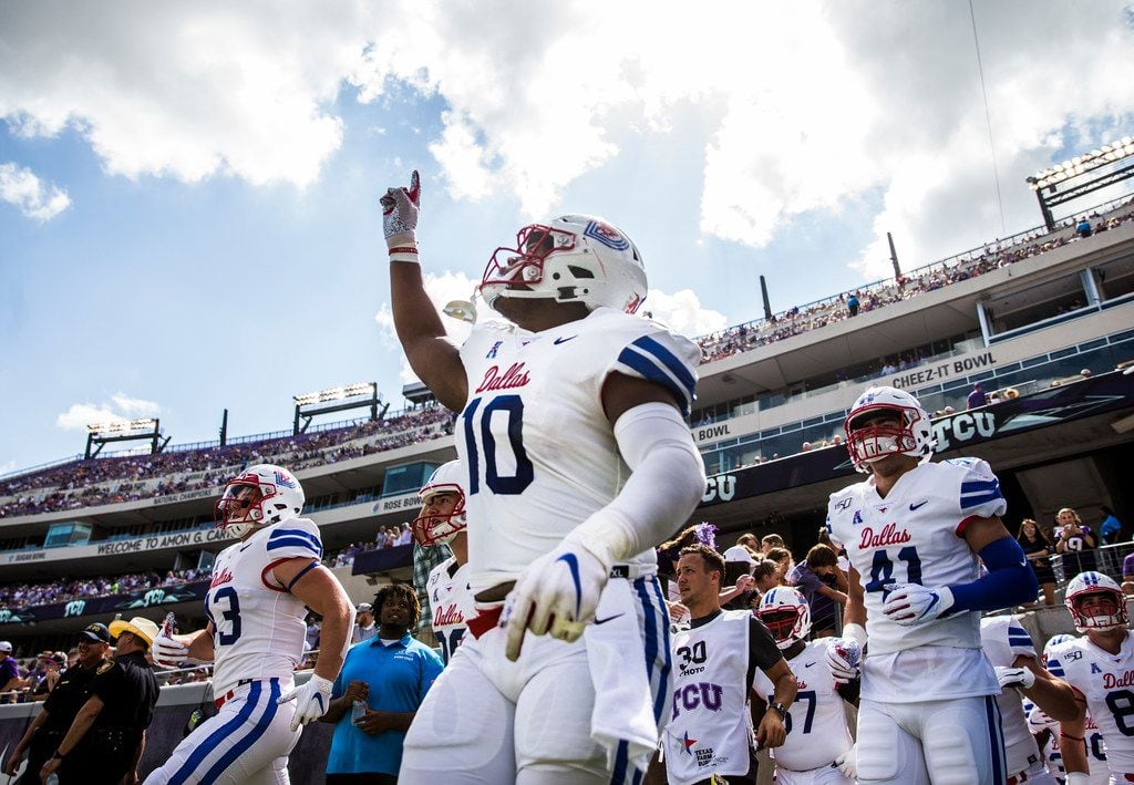 Southern Methodist Mustangs defensive tackle Demerick Gary (10) runs on to the field before...
