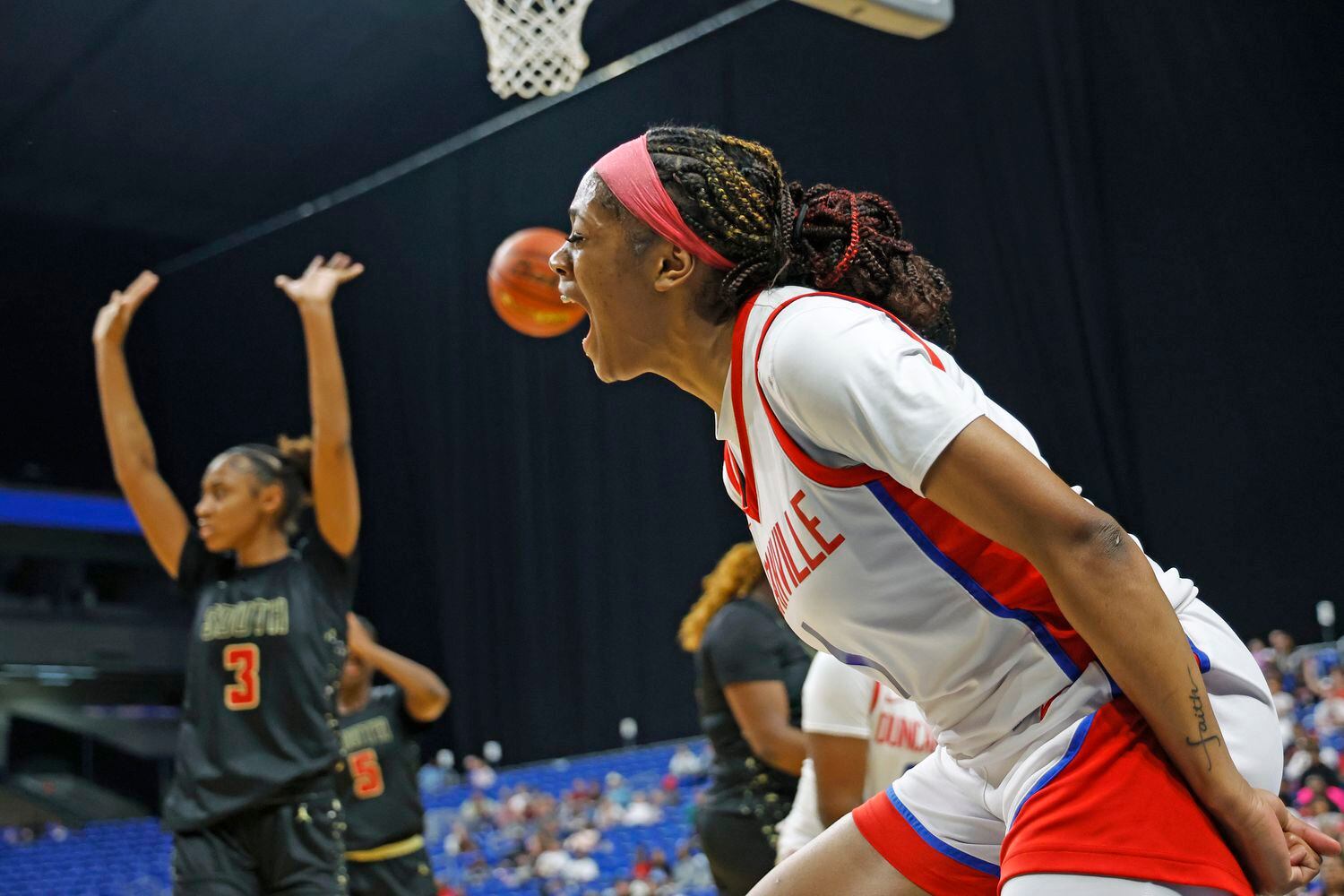 Duncanville's Mariah Clayton (1) celebrates during the UIL Class 6A girls basketball state...