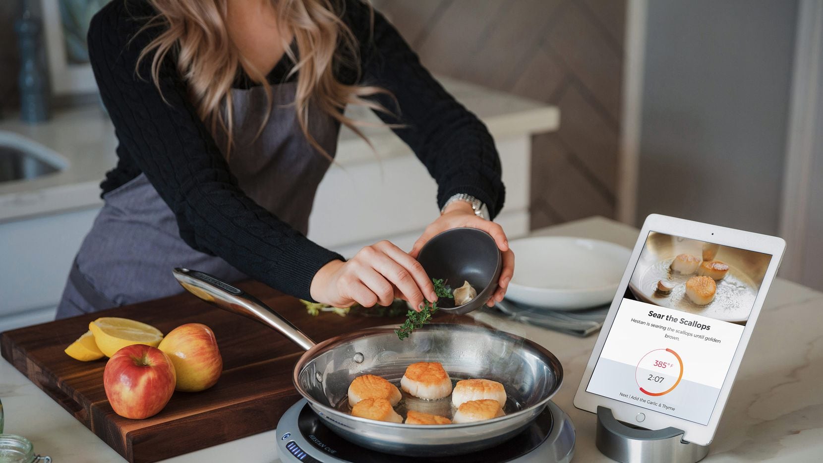 You'll want to keep your phone or tablet close by to help with controlling the cookware and...