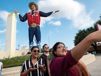 Nehan Farhat, 24, takes a selfie with a group of friends including Carlos Valdez, 34, left,...