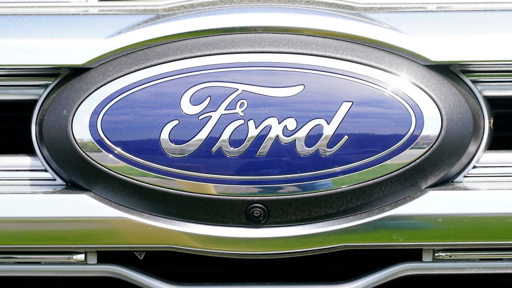 FILE - A logo on a vehicle at a Ford dealership in Springfield, Pa., Tuesday, April 26,...