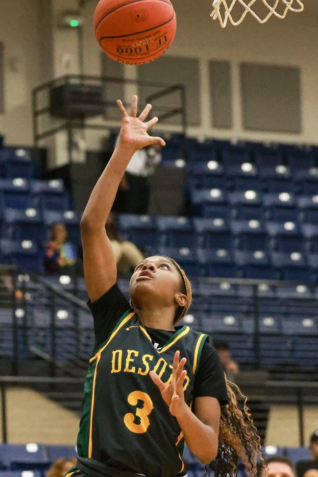 DeSoto High School Rieyan DeSouze (3) shoots a two-pointer during the game against Lake...