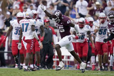 Texas A&M linebacker Edgerrin Cooper (45) reacts after an interception against New Mexico...