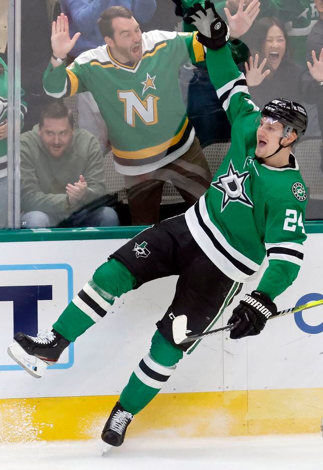 Dallas Stars center Roope Hintz (24) celebrates his second period goal with fans during...