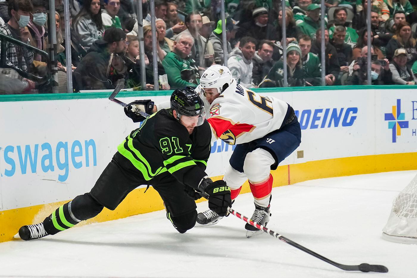 Dallas Stars center Tyler Seguin (91) fights for the puck against Florida Panthers...