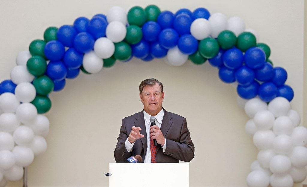 Mayor Mike Rawlings speaks during a press conference at Southwest Center Mall. A new 22,000...