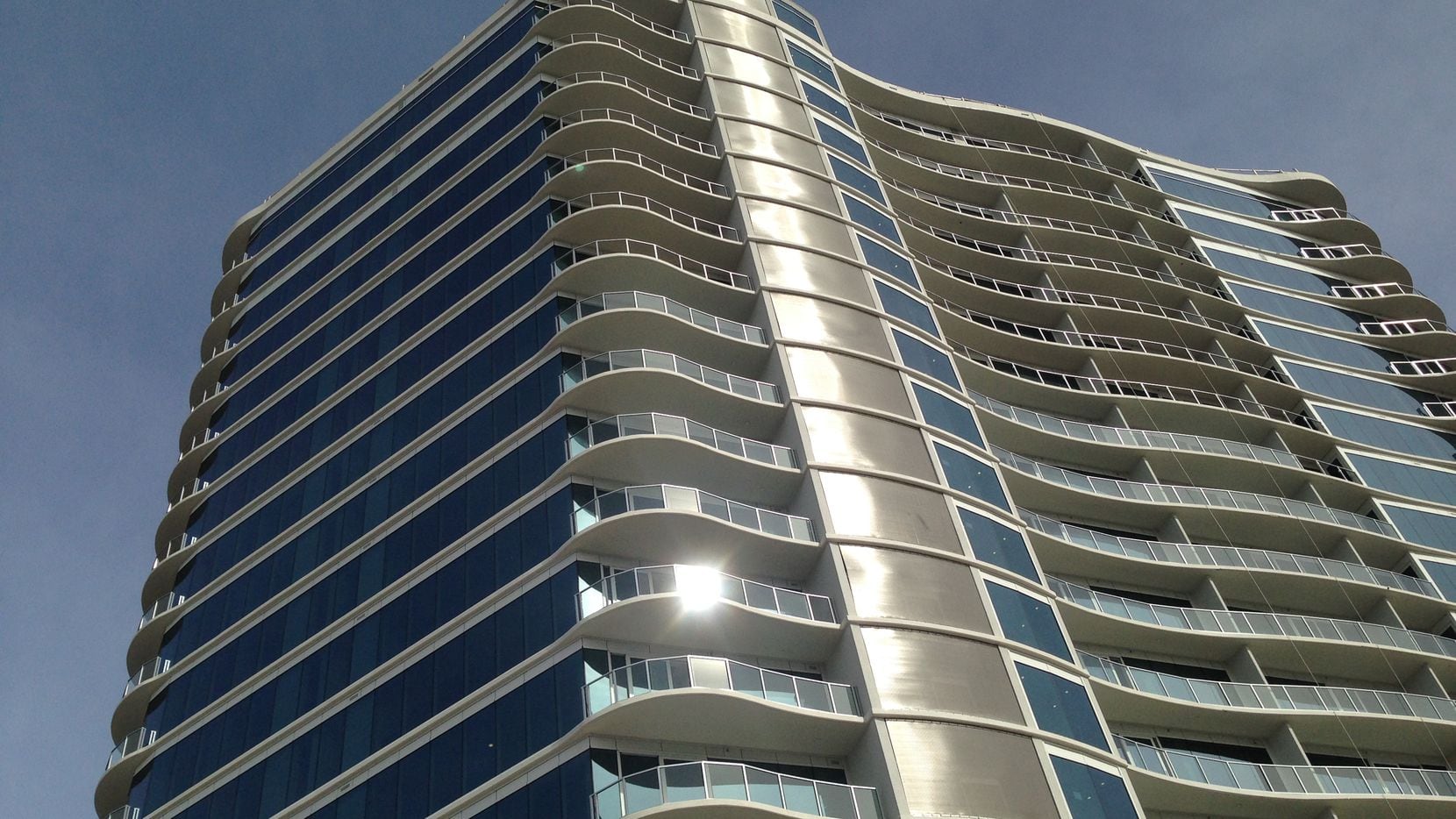 The One Uptown apartment tower opens next week at Routh and McKinney Avenue.