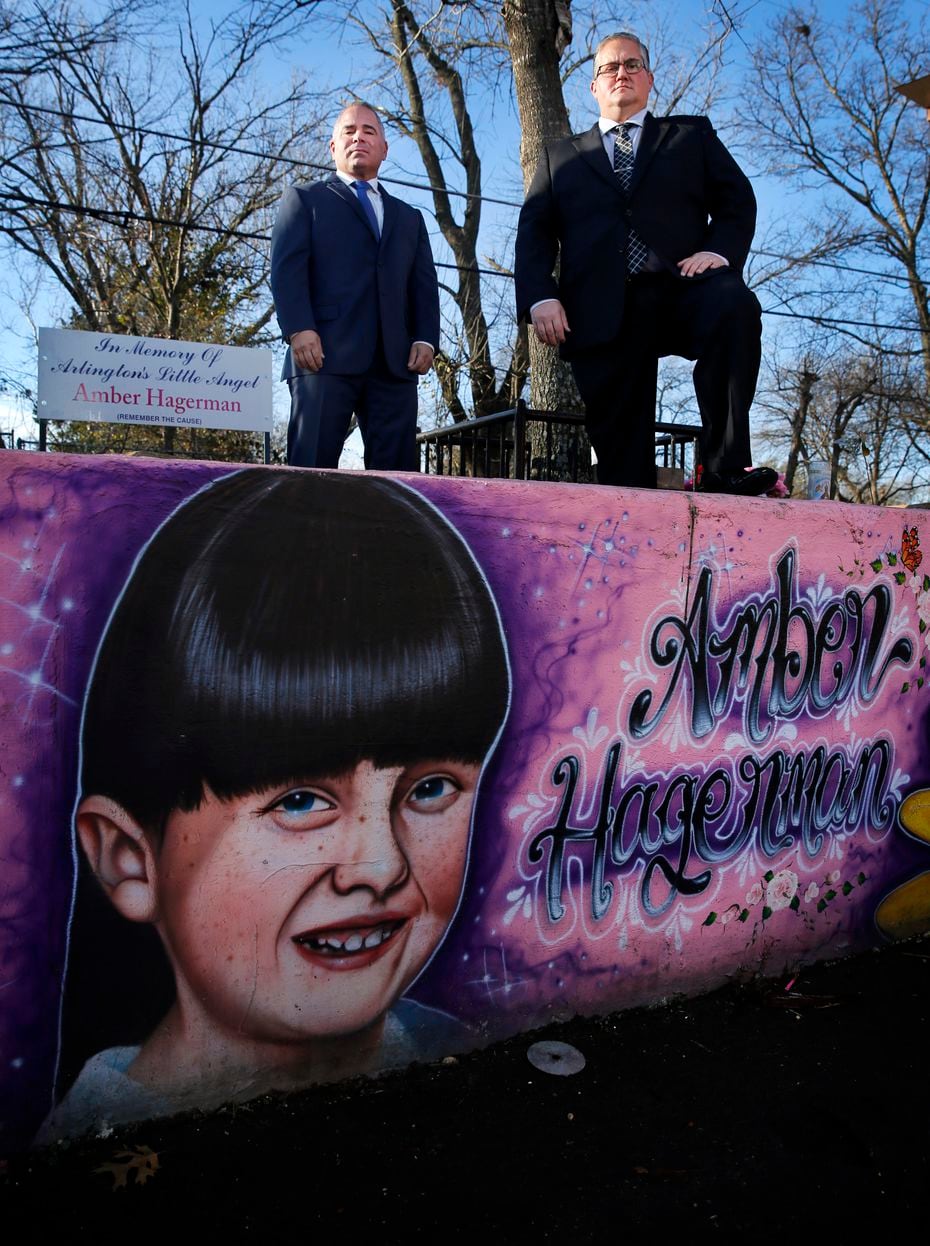 Arlington Police Sgt. Ben Lopez (left) and Det. Grant Gildon are pictured at a memorial for Amber Hagerman. Twenty-five years since her kidnapping, they hold out hope that there could one day be a breakthrough in her case.