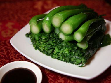Gai lan with oyster sauce at Kirin Court. Though often referred to as "Chinese broccoli,"...