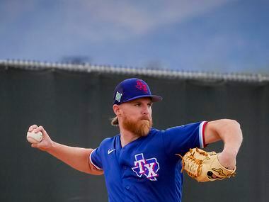 Texas Rangers pitcher Jon Gray warms up in the bullpen before pitching in a “B” game on the...
