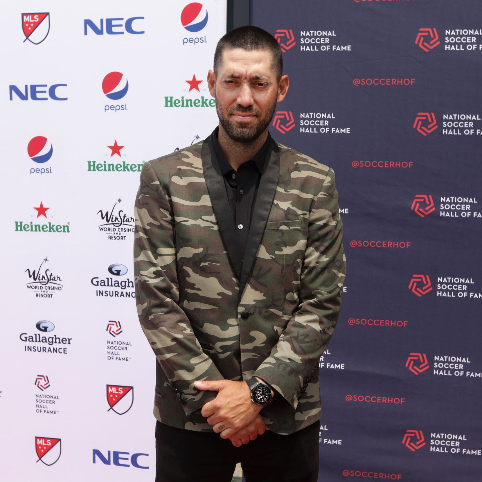 Clint Dempsey poses for a photograph during the National Soccer Hall of Fame ceremony at...