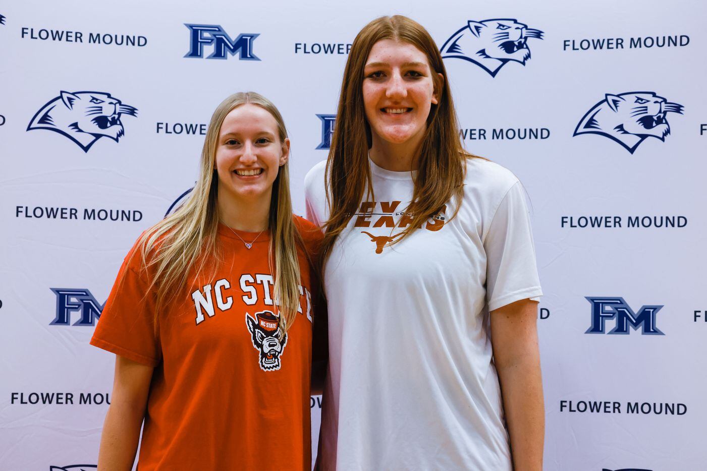 Maddie Cox, left, and Abbie Boutilier, during the signing day ceremony in Flower Mound on...