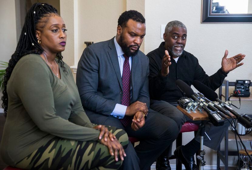 Attorney Lee Merritt (center) and the parents of Darius Tarver, Froncella Reece (left) and...