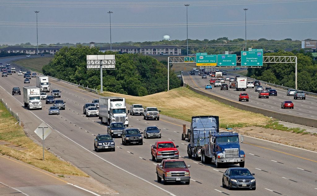 Traffic moves on Interstate 20 near the U.S. Highway 287 and Interstate 820 interchange in Fort Worth.